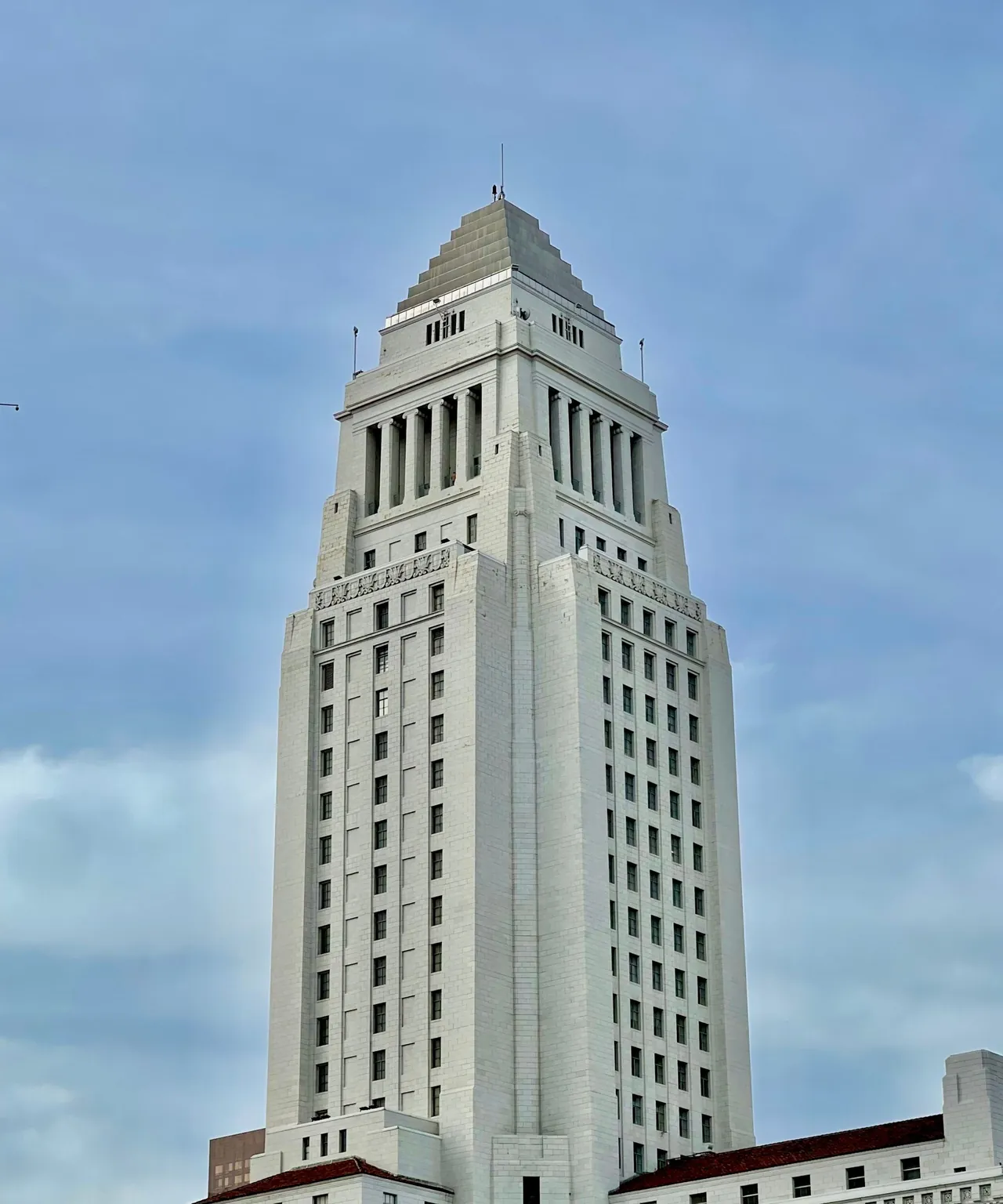 Los Angeles City Hall against a blue sky